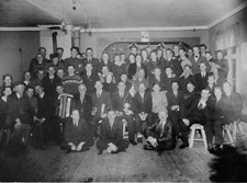 Från Bergmans gård, Högland, Ljustorp Socken, Timrå, Medelpad, Västernorrland
Fotot är daterat till 1945
Fotograf : Okänd

Övrig information  om bilden : 
Skytteföreningens årsfest. Festen hölls i Bergmans hus.

Personerna på bilden är från Vänster: Valter Åsen, Erik Petter Bergman, Bert Backström, Erik August Sandström, Sven Nordin, Evy Johansson, Lars Stig Dahlin, Erik Bertil Frölander, Alfhild Sidelius, Svea Kristina Bergman, Vera Nordlander, Emil Jonsson, Britta Rydberg, Svea Bergström, Ebba Erika Bergman, Anna Maria Bergman,  Okänd, Anna Greta Björklund, Siri Sjödin, Per Egon Ivan Jonsson, Per Valter Edén, Olof Elvor Sandström, Göta Hallin, Ingrid Hallin, Gerd Westin, Ada Sidelius, Karl Erik Holmberg, Allan Viksell, Olof Gideon Frölander, Lars Rudolf Nordstrand, Miles Ingemar Nyberg, Einar Åhlin, Selma Ingeborg Åhlin, Elvira Kristina Lindgren, Gustav Lindgren, Stig Nordin, Tage Åhlin, Karl Anton Nilsson, Bengt Gösta Viksell, Lars Magnus Bergman, Elsy Olivia Lindström, Kurt Frans Lindström, Ola Vretström, Anders Erik Otto Sjöberg, Enar Viklund, Arthur Boström, Henning Åhlin, Ivar Svelander, Ture Alf Ivan Jonsson, Paul Bergstedt, Nils Petrus Nordlander, Karl Magnus Nyberg, Per Gunnar Lundberg, Ture Johan Holmberg, Verner Emanuel Jonsson, Anders Albin Bergman.